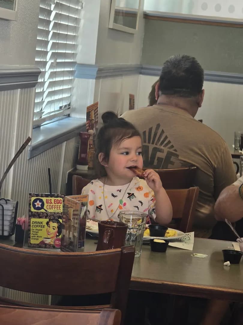 Happy child enjoying their meal