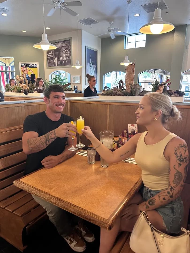 Couple celebrating with drinks