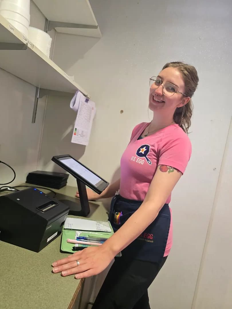 Helpful employee at service counter