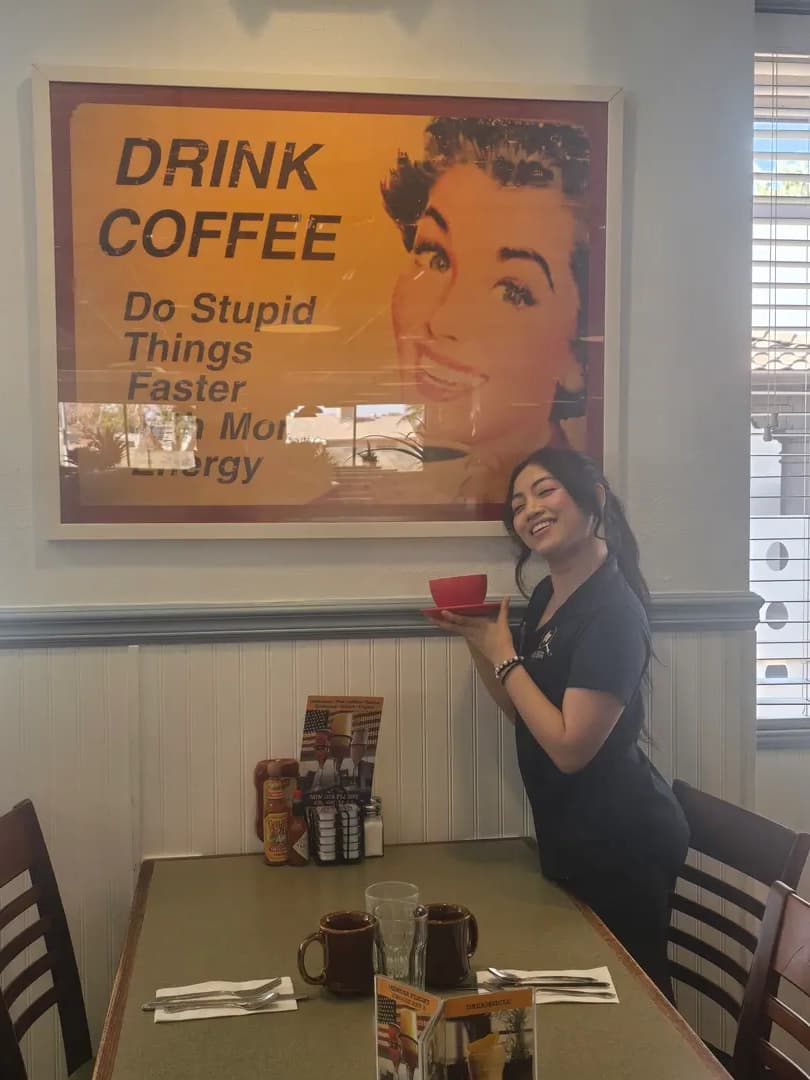 Friendly server with fresh coffee